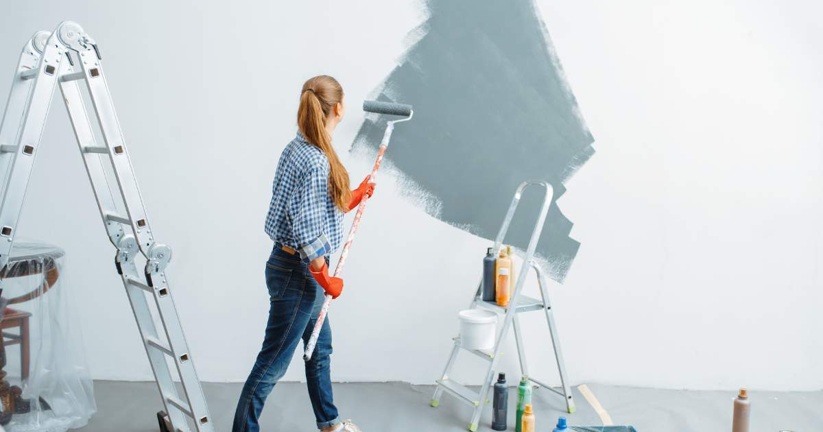 Woman Painting House